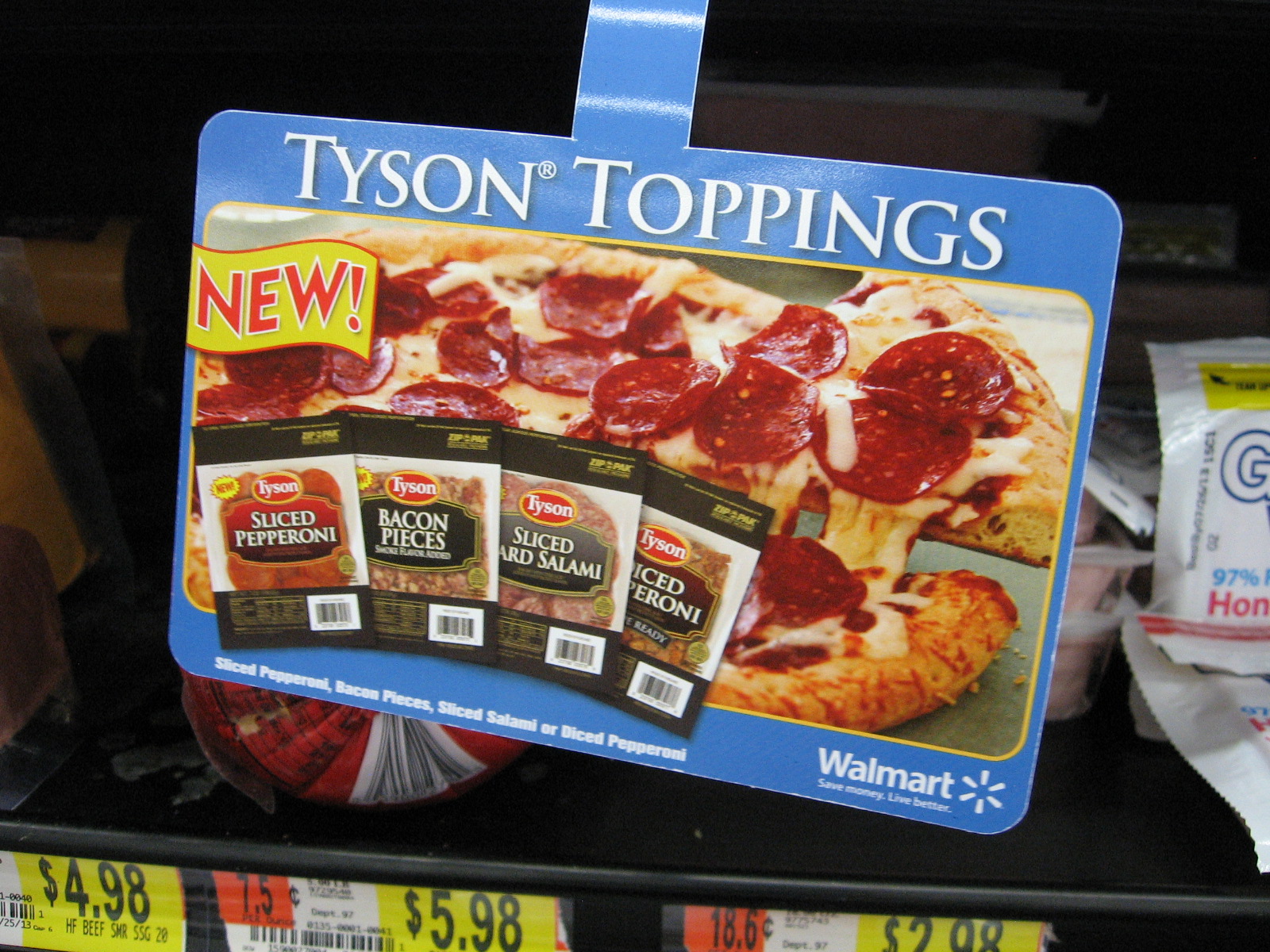 It always helps me to know what I'm looking for and what it looks like. These directional signs with all four varieties of Tyson Toppings made that easy at Walmart. 