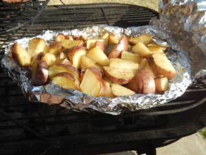 Cut new potatoes with olive oil and peppercorn pepper are great on the grill. 
