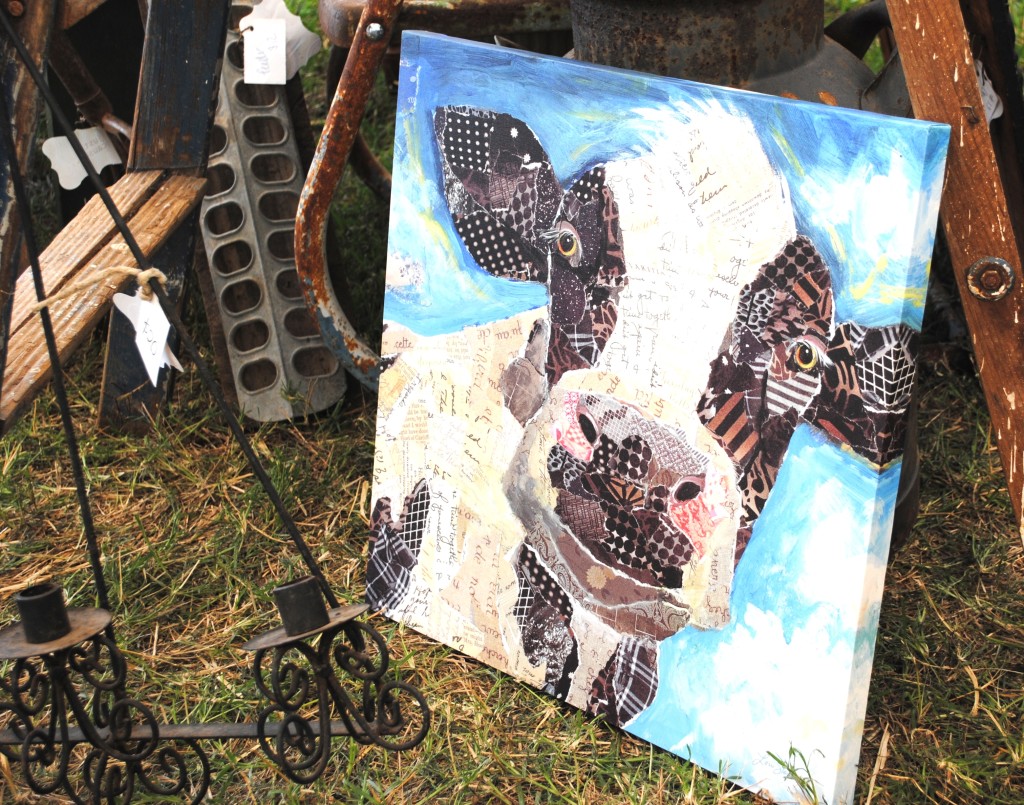 This picture looks like a mosaic (picture created from tiny pieces of other items, like glass). But it's really a painting. Don't know why I took a picture of a picture of a cow, but it just caught my attention so I snapped away! 