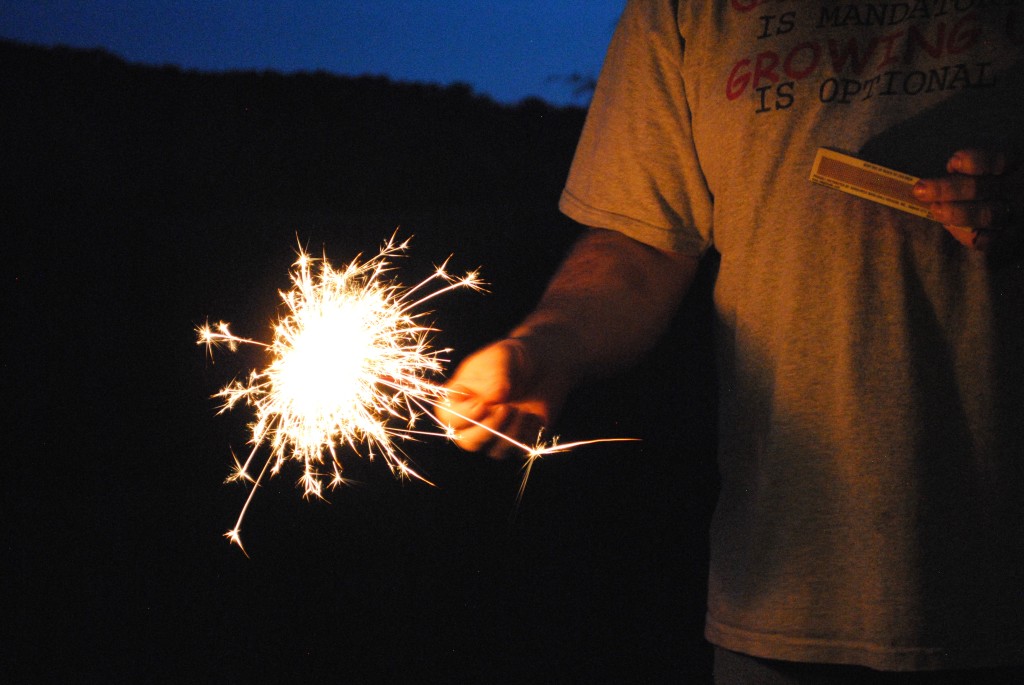 Did I mention I like sparklers? This is an angle of John holding one. 