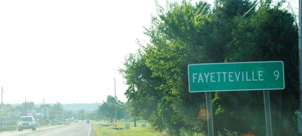 OIA Elkins Fayetteville distance sign