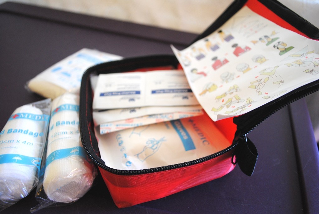 You need a first-aid kit that you either create or purchase as a kit. I have a easy kit. Also grab your medicines that you take on a regular basis. With insurance being the way that it is, you can't easily get spare meds so I would recommend getting your medications together in a bag when you first learn there might be bad weather in your area. That makes it easy to grab. 