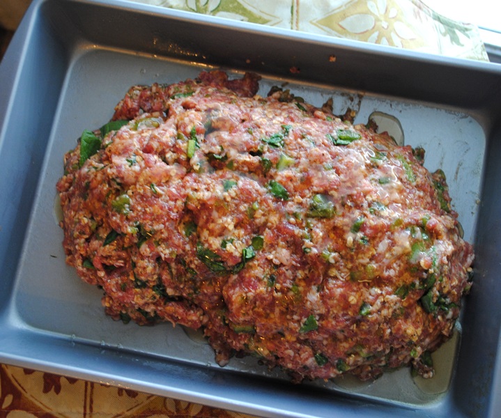 Cover the eggs with the rest of the meatloaf and add the maple syrup if you want it. 
