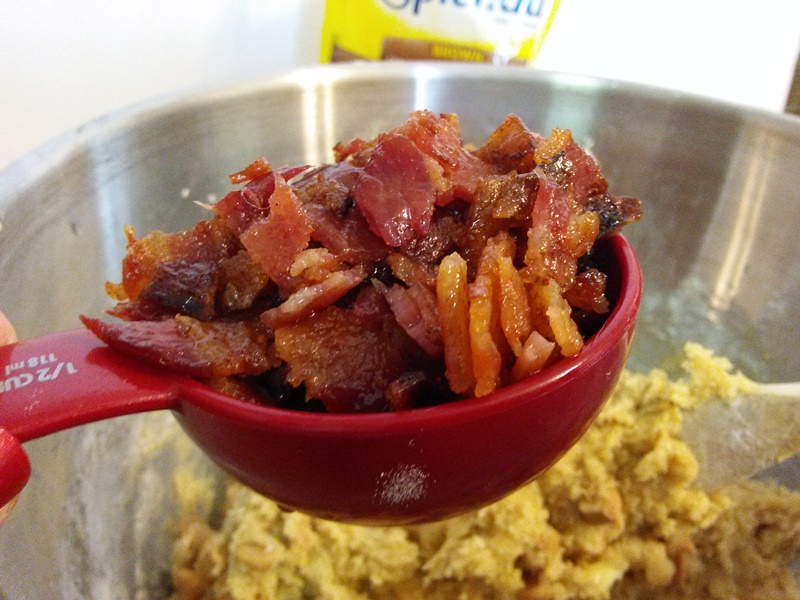 Put a heaping 1/2 cup of bacon pieces (about 7 pieces of bacon) and mix evenly throughout dough. 