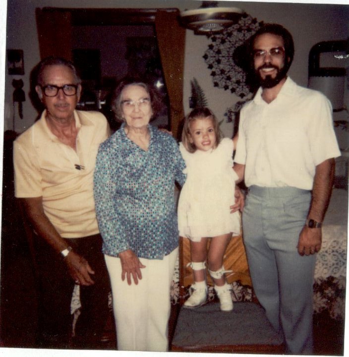 This picture is more than 30 years old and is a scan of a Polaroid (remember those?). That's my grandpa on the far left, Grammy (great-grandma), and my dad. Oh, and that cute little girl is me! Grammy would make Cornish hens for the family for special occasions. 