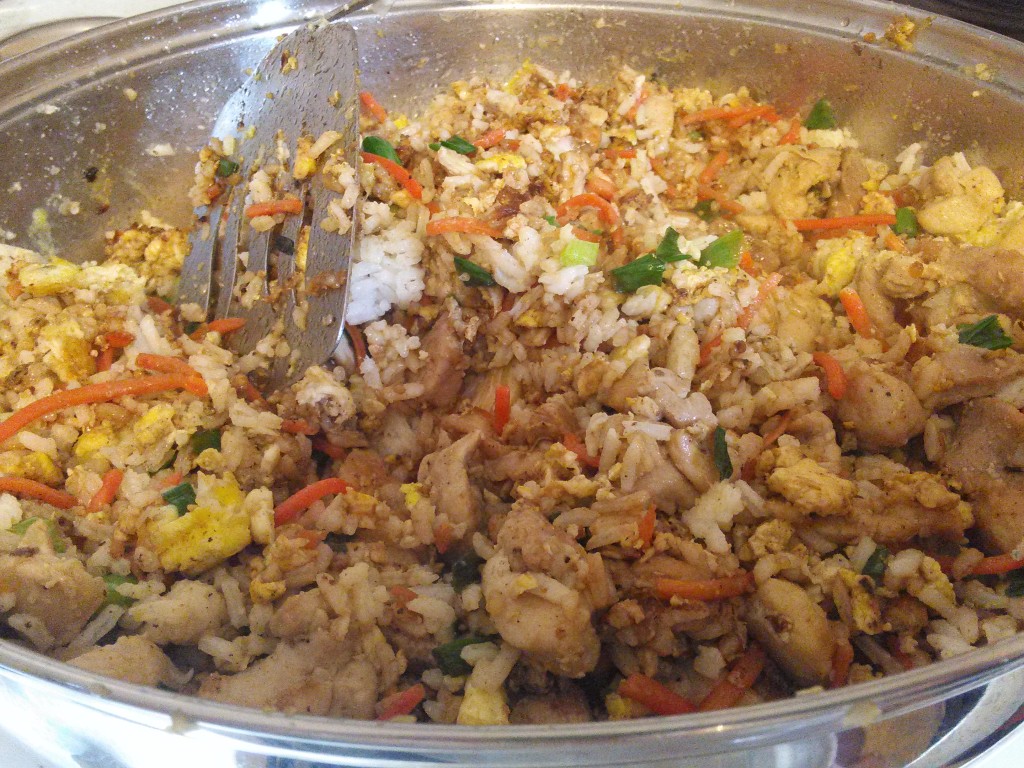 Mix the rice, chicken, eggs and veggies together. Then coat with the soy sauce. 