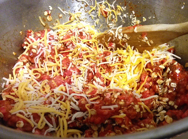 Mix in 1/2 cup of the finely shredded cheese. I emphasize finely (or "fancy) shredded because regular shredded will make it too greasy. 