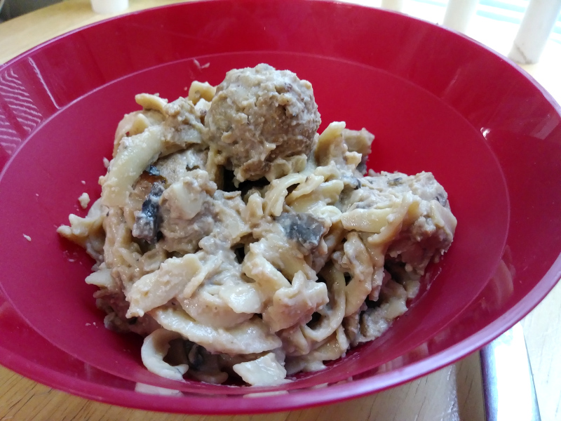 Picture of swedish meatballs in a red bowl. 